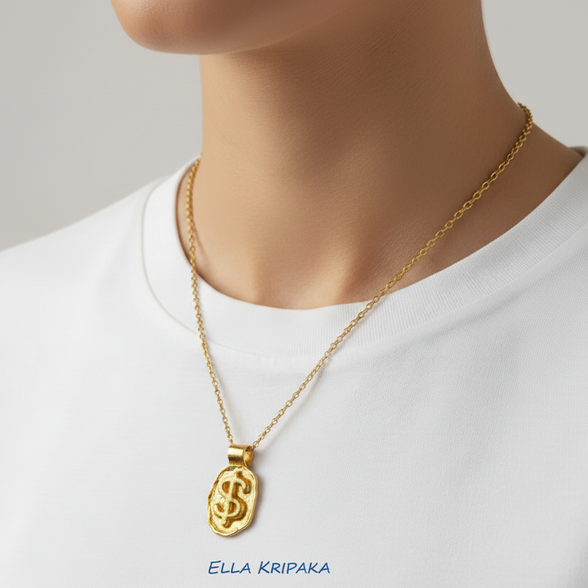 Hammered 24k 9999 Gold organic uneven pendant with convex 'Dollar Sign' and with chain is wearing on model in white t-shirt, artist's name 'Ella Kripaka'