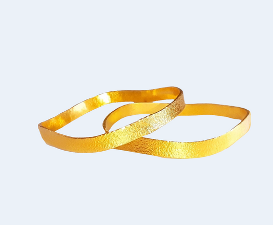 Custom hammered 22k gold bangle bracelet uneven forged 22k gold bangle artist Ella Kripaka