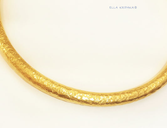 24k gold hammered textured bracelet bangle, indicating it is a custom-made jewelry with creator's signature 'Ella Kripaka'