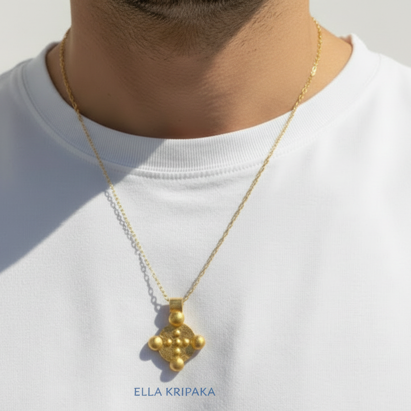 24k 9999 gold hammered Byzantine disk pendant with chain wearing on person is in a white t-shirt, artist's name 'Ella Kripaka'