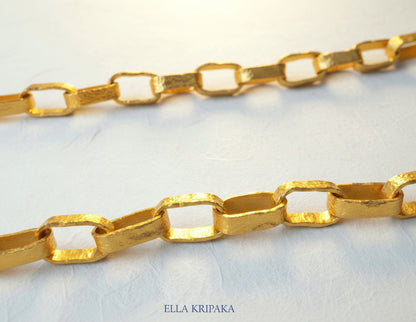 Hammered 24k 9999 gold chain thick necklace on a white paper background, artist-jeweler name 'Ella Kripaka' branding