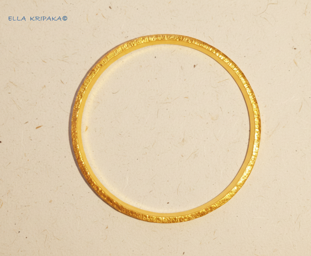 Hammered 24k 9999 gold bangle thick bracelet Ancient Rome style on a neutral background, branding artist-jeweler name 'Ella Kripaka'