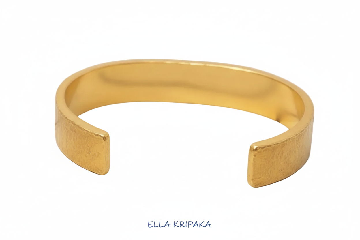 Hammered 24k 9999 gold bracelet cuff Ancient Rome style on a white background, branding artist-jeweler name 'Ella Kripaka'