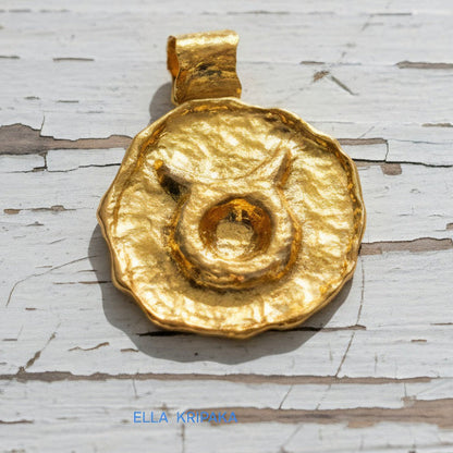 Hammered 24k 9999 gold Organic pendant with Taurus sign, handmade forged 24k gold jewelry, branding artist name 'Ella Kripaka'