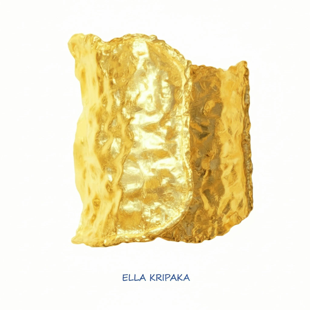 Organic 24k gold hammered wavy cuff large bracelet with thick uneven textured borders is on white background, branding artist-jeweler name 'Ella Kripaka'