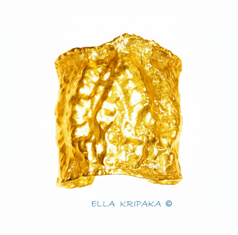 Organic 24k gold hammered wavy cuff large bracelet with thick uneven textured borders is on white background, branding artist-jeweler name 'Ella Kripaka'