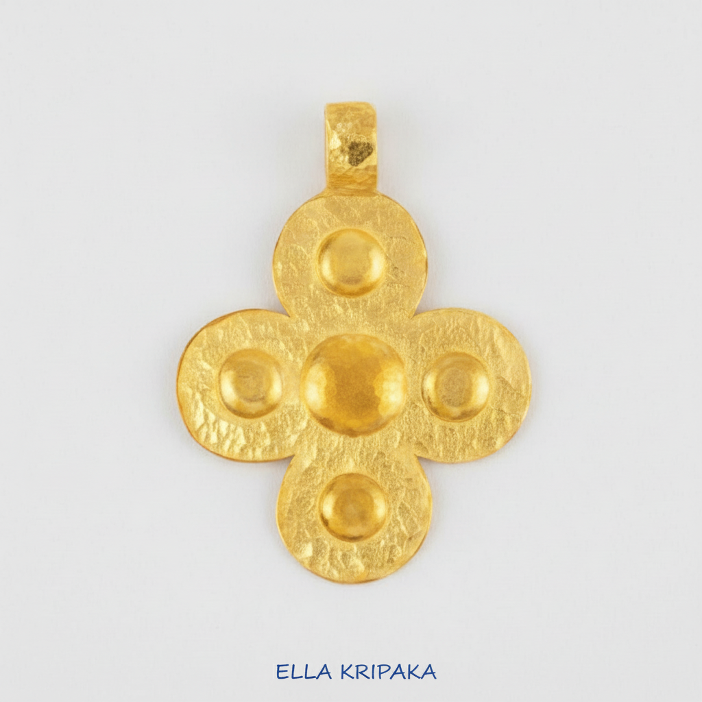 24k 9999 gold hammered Byzantine cross pendant with forged gold textures is on a white surface, artist's name 'Ella Kripaka'