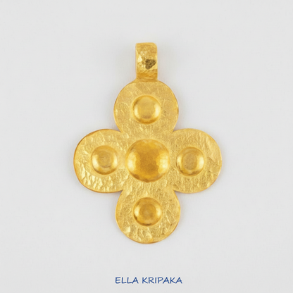 24k 9999 gold hammered Byzantine cross pendant with forged gold textures is on a white surface, artist's name 'Ella Kripaka'