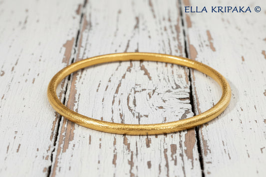 24k 9999 gold hammered Ancient Rome style bracelet bangle, indicating it is a custom-made bracelet