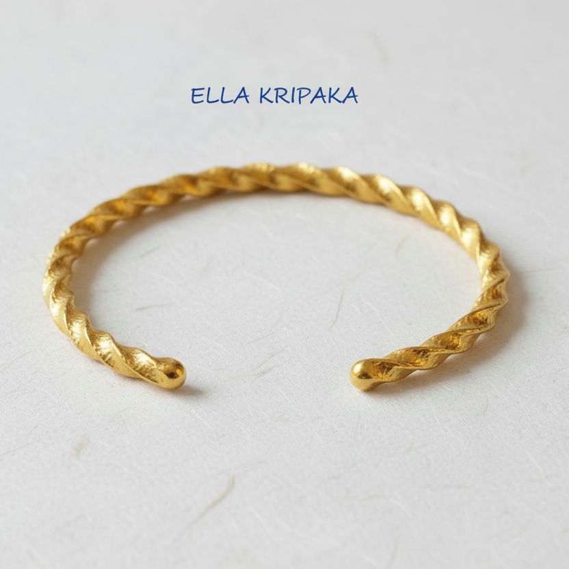 Viking Twisted Hammered 24k 9999 gold cuff thick bracelet on a white background, artist-jeweler name 'Ella Kripaka' branding