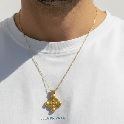 24k 9999 gold hammered Byzantine disk pendant with chain wearing on person is in a white t-shirt, artist's name 'Ella Kripaka'