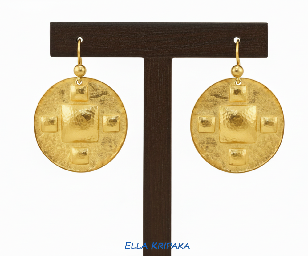Hammered 24k 9999 Gold Byzantine earrings on a wooden jewelry stand with 'Ella Kripaka' branding