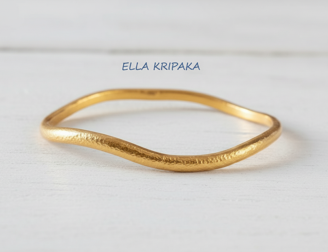 Organic 24k gold hammered shiny bangle thick bracelet with uneven shape, artist-jeweler 'Ella Kripaka' branding