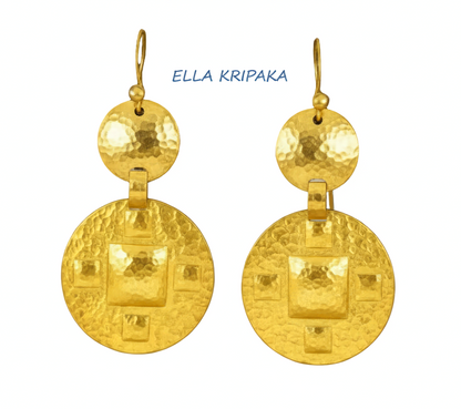 Solid 24k 9999 gold hammered Byzantine earrings with hook clasps and shiny forged gold textures on old wooden background , artist's name 'ELLA KRIPAKA'