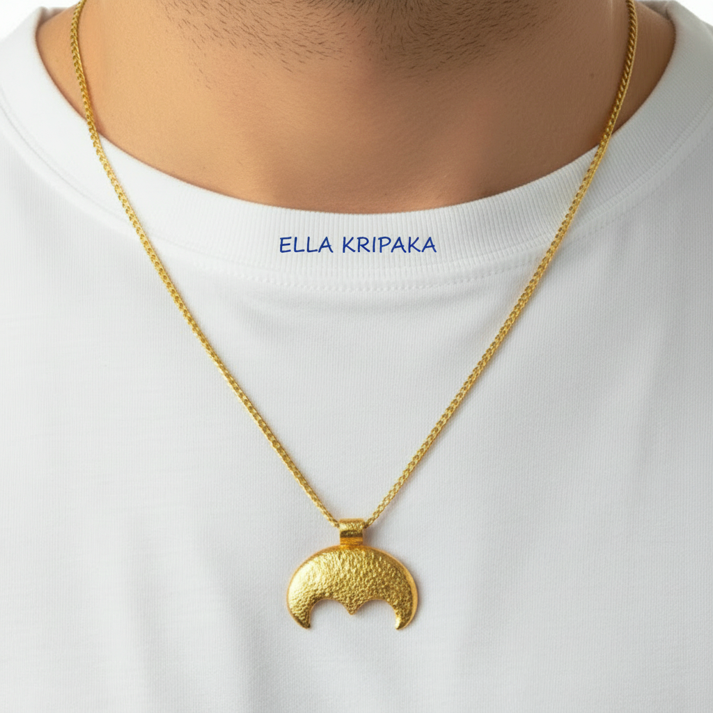 Hammered 24k gold convex Moon pendant with chain worn by a person and with a white blurred background with 'Ella Kripaka' branding