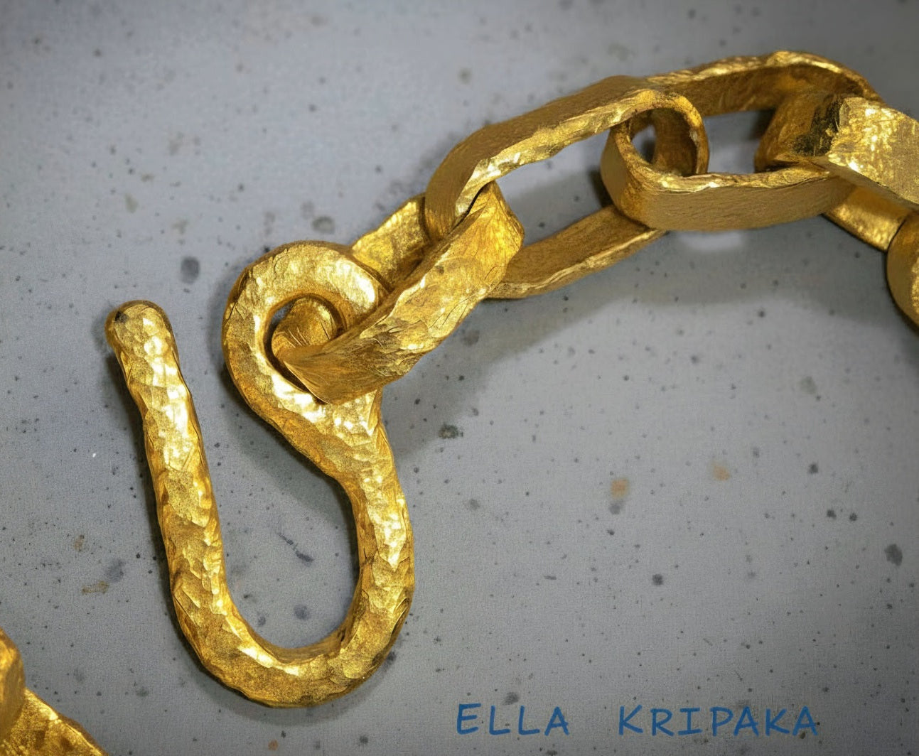 Hammered 24k 9999 gold chain with thick hook clasp Ancient Rome style on a grey background, artist-jeweler name 'Ella Kripaka' branding