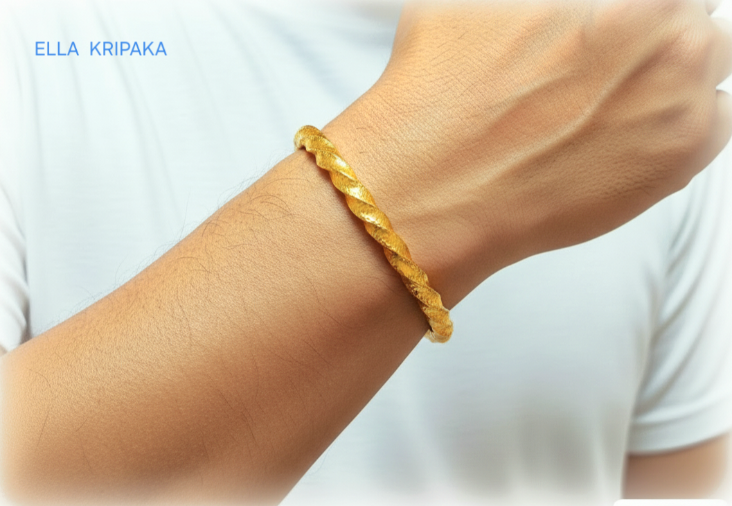 Viking twisted hammered 24k 9999 Gold thick cuff bracelet wirn on wrist by a man on a white t-shirt background, and with 'Ella Kripaka' branding