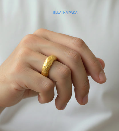 Hammered organic 24k Gold 9999 gold uneven signet thick ring wirn on man's finger and on a white t-shirt background, branded 'Ella Kripaka'