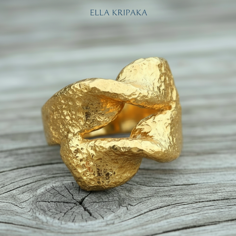 Twisted hammered 24k 9999 Gold ring signet with textured gold on a wooden surface, artist-jeweler's name 'Ella Kripaka' is written on picture