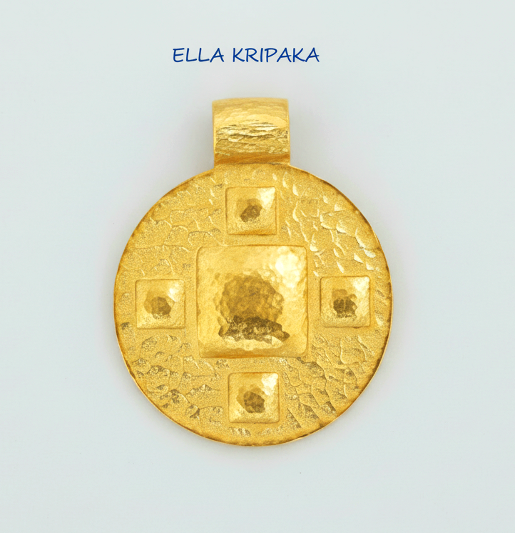 24k gold disk pendant textured hammered with convex pattern on light grey paper background, with 'Ella Kripaka' branding
