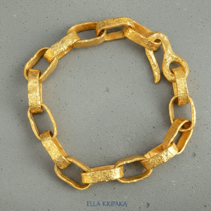 Hammered 24k 9999 gold chain thick bracelet with thick hook clasp Ancient Rome style on a grey background, artist-jeweler name 'Ella Kripaka' branding