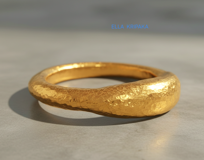 Hammered organic 24k Gold 9999 gold signet thick ring band with textured gold on a grey concrete background, branded 'Ella Kripaka'
