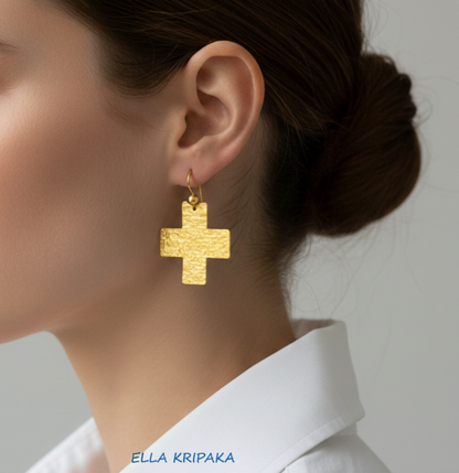Hammered 24k 9999 Gold Byzantine cross earrings wearing by a person, and artist's name 'Ella Kripaka' branding