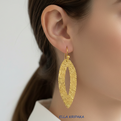 Hammered 24k 9999 Gold Byzantine Leaf earrings wearing by a person, and artist's name 'Ella Kripaka' branding
