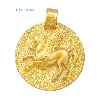 Hammered 24k Gold 9999 gold disk pendant with convex Pegasus and with textured gold on a white background, branded 'Ella Kripaka'