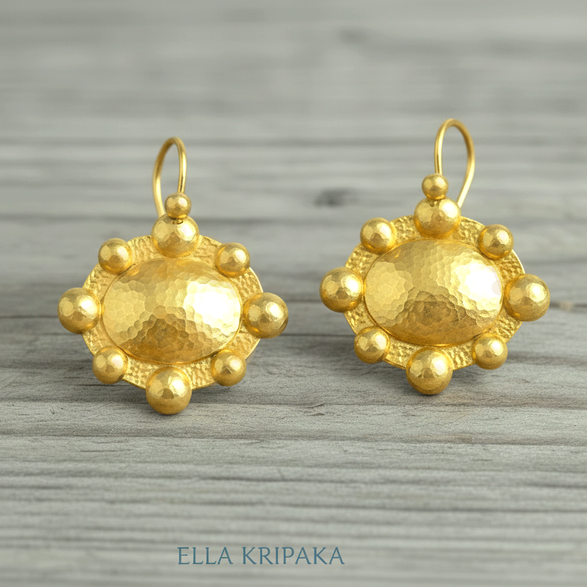 Hammered 24k 9999 Gold Byzantine convex earrings on a old wooden background with 'Ella Kripaka' branding