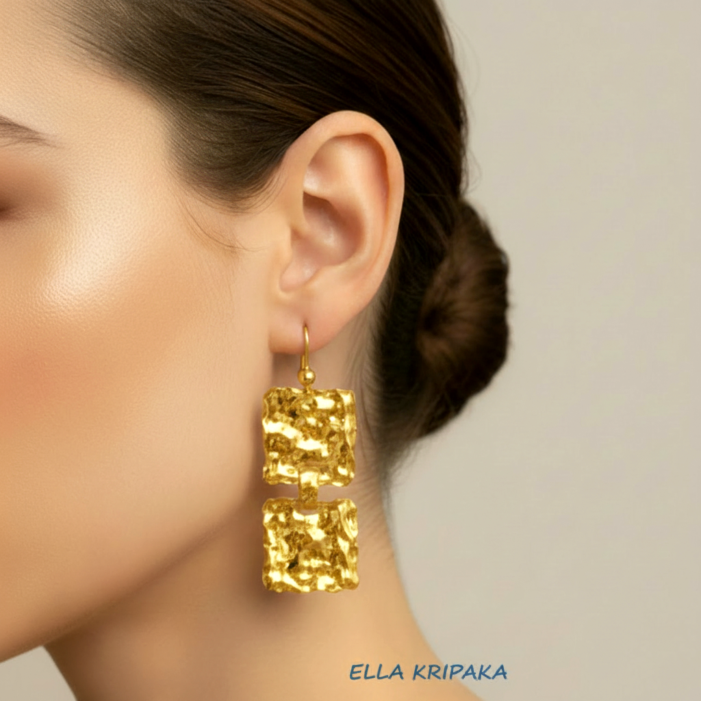 Hammered 24k 9999 gold wavy organic square earrings worn by a model with a neutral background, branded 'Ella Kripaka'